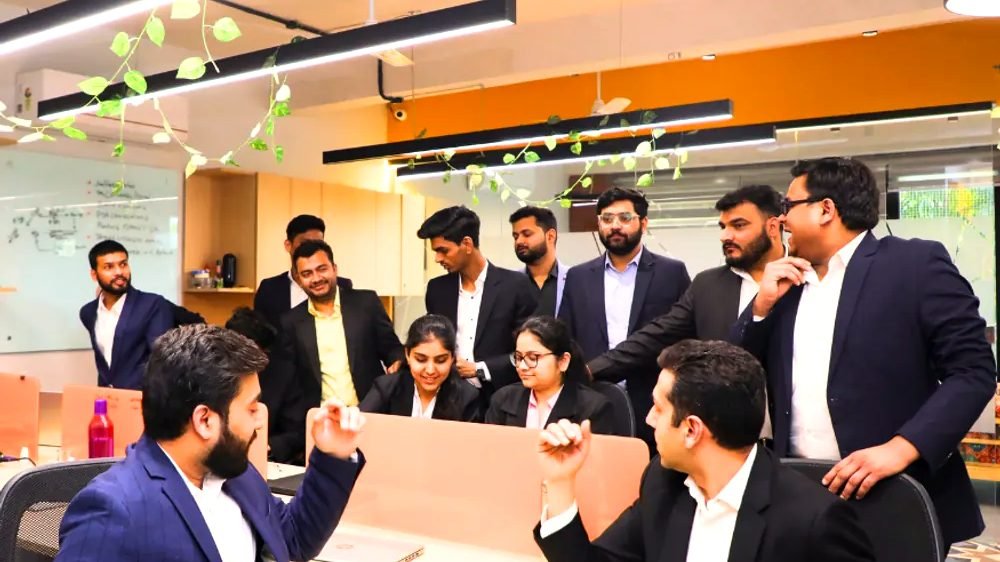 The team reviewing a file together at a desk