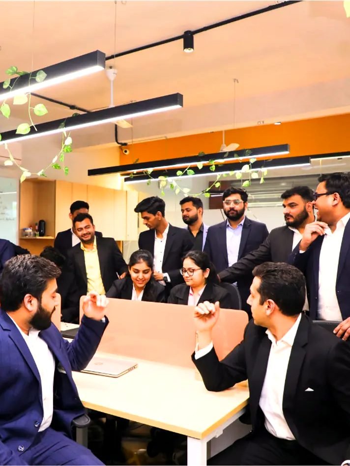 The team reviewing a file together at a desk