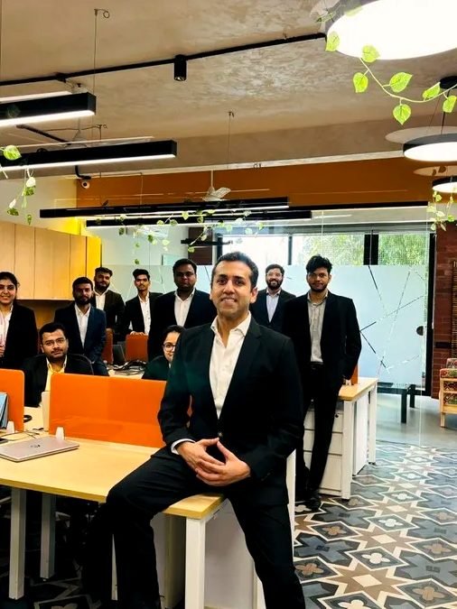 The team at work in the open-plan office